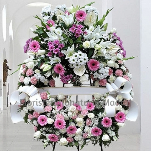 Corona funeraria tonos rosados